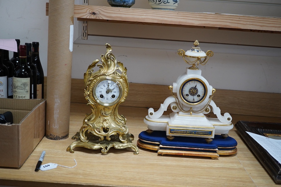 A late 19th century French ormolu mantel clock and another clock in an alabaster case, 39cm. Condition - fair to good